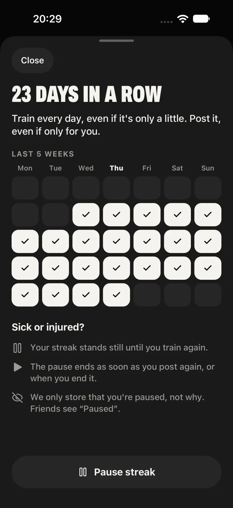 The streak sheet: 23 days in a row, the last five weeks, how pausing works and the Pause streak button.